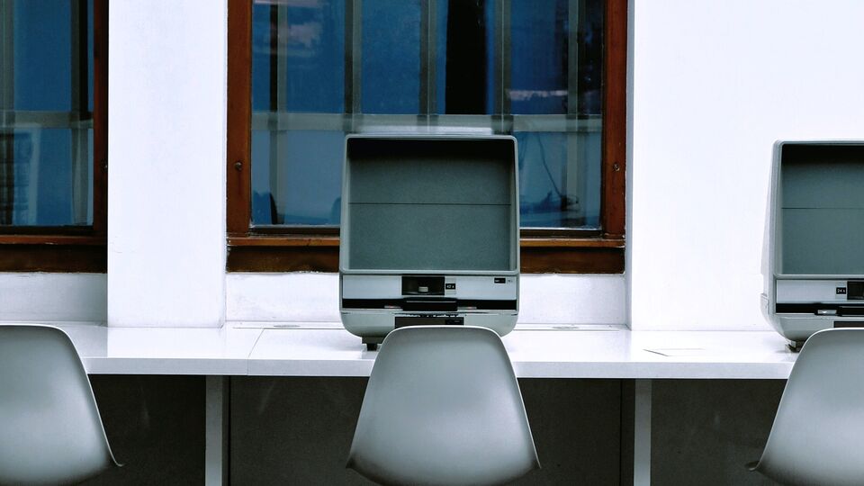 Microfiche research machines in a library