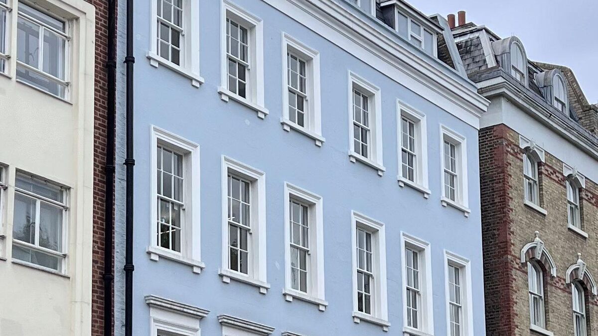 Image of the exterior of 11-13 Charlotte Street, a blue painted character building