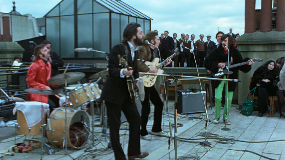 The Beatles, performing on a roof